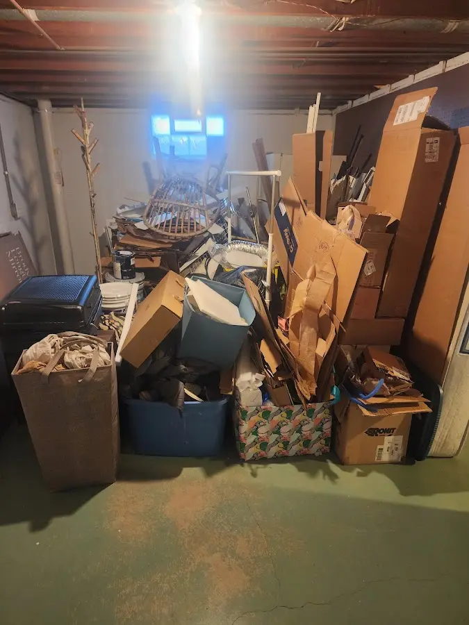 Roll-off dumpster container at job site for 15 Yard Dumpster Rental in Apex